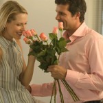 Couple with Bouquet of Roses